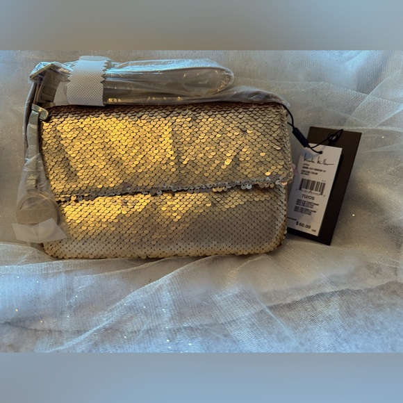 Nicole Miller Handbags - NWT MSRP $60 Nicole Miller Gold Sequin Clutch with Metallic Strap